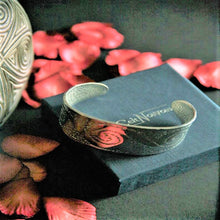 Load image into Gallery viewer, Pewter Bangle Wide Tapering Cuff with engraved Spiral design by St. Justin of Cornwall